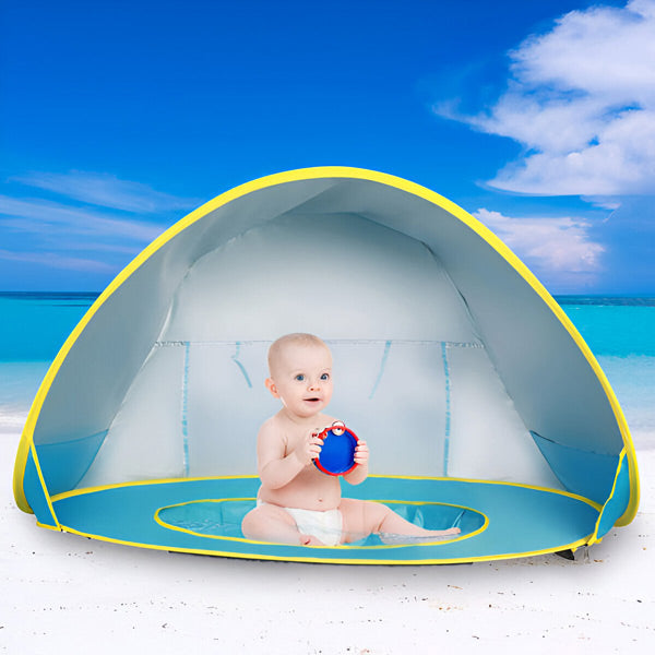 Uma tenda para crianças com protecção UV e uma piscina